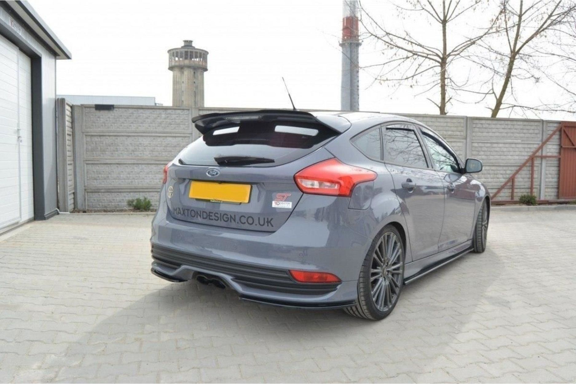 Maxton Design ABS Diffusor Seiten Eerwiterungen Flaps für Ford Focus MK3 ST|RS Facelift schwarz hochglanz (4) 